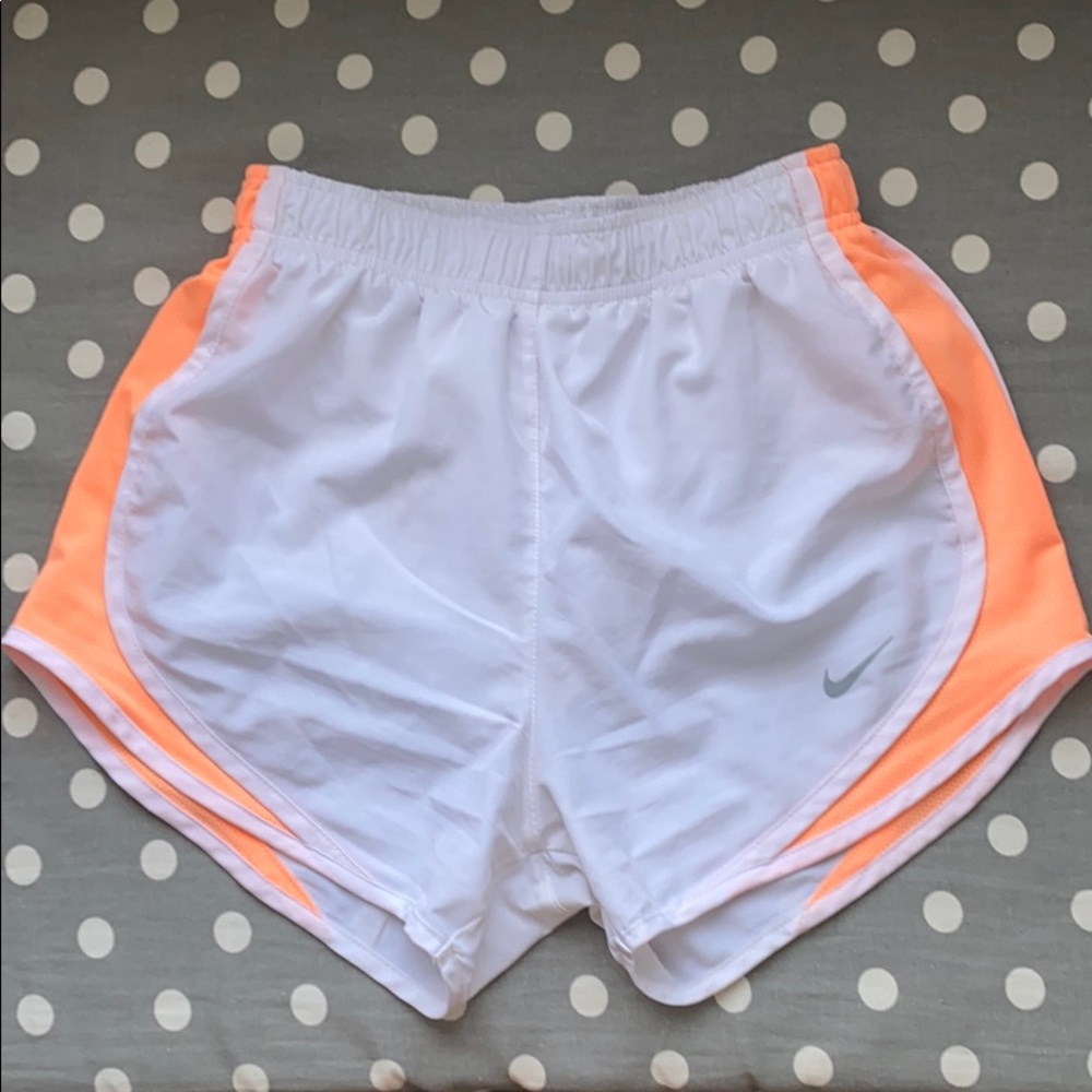white and orange nike dri-fit shorts